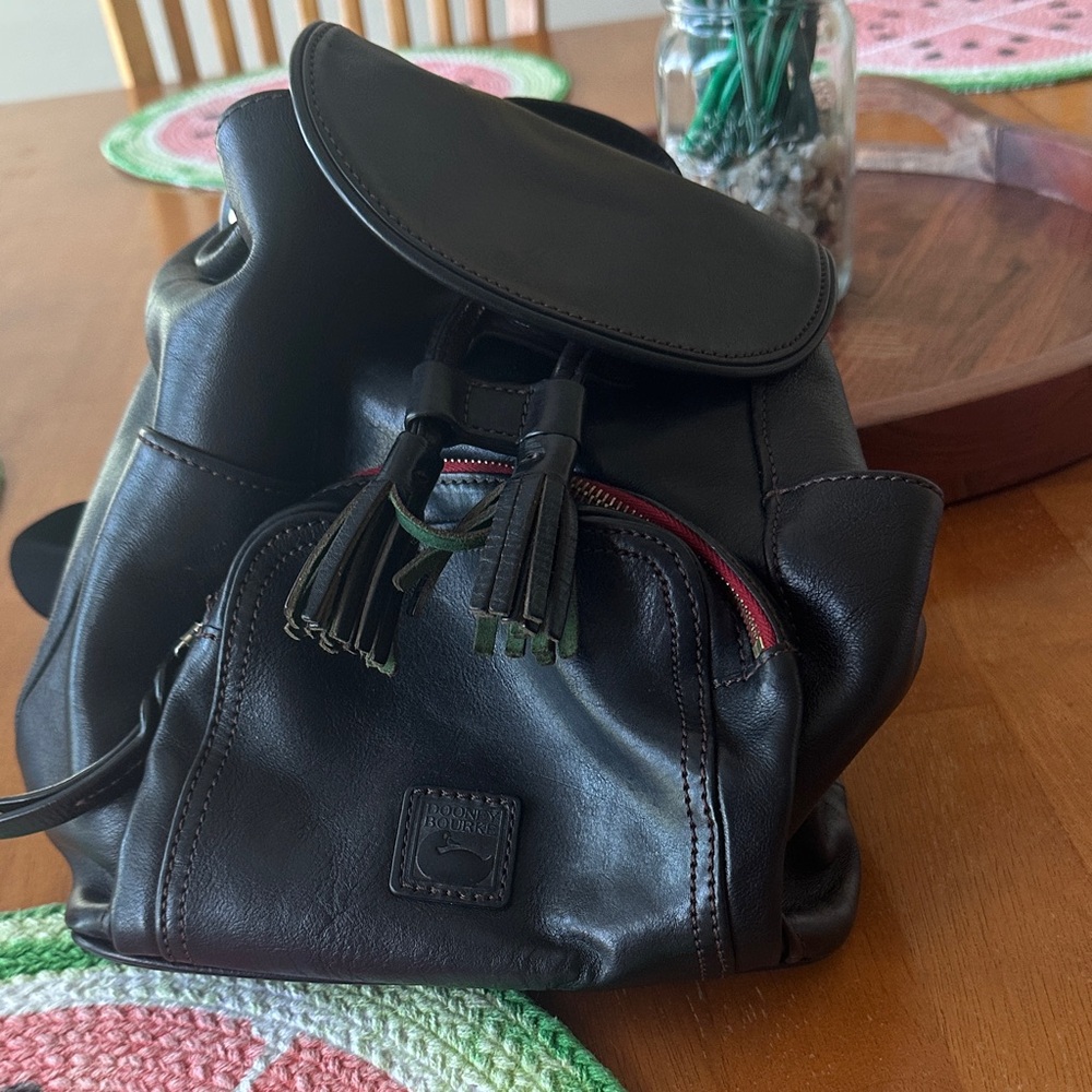 Black Leather Dooney and Bourke Backpack with Tassel